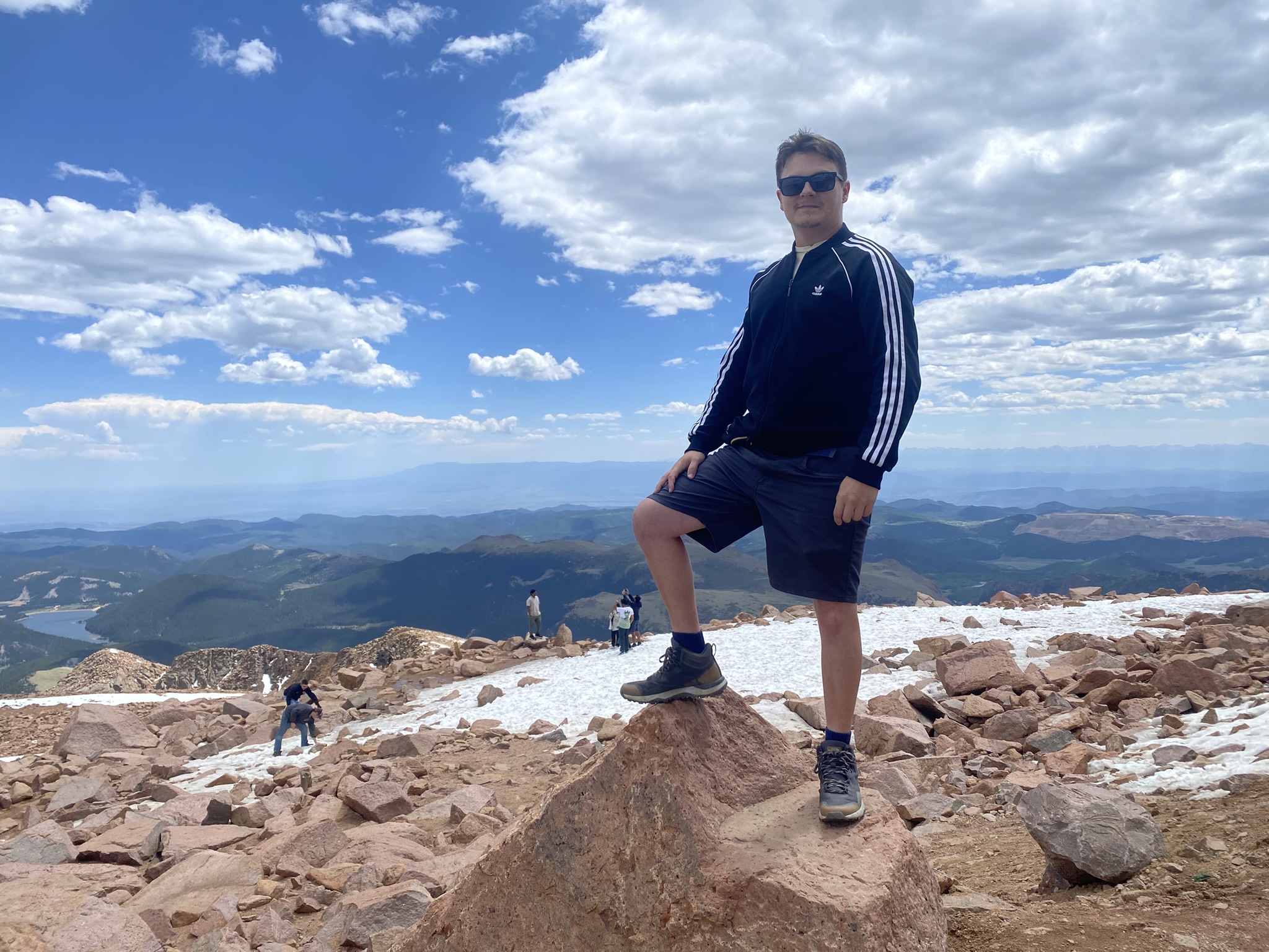 Someone standing on top of Pikes Peak